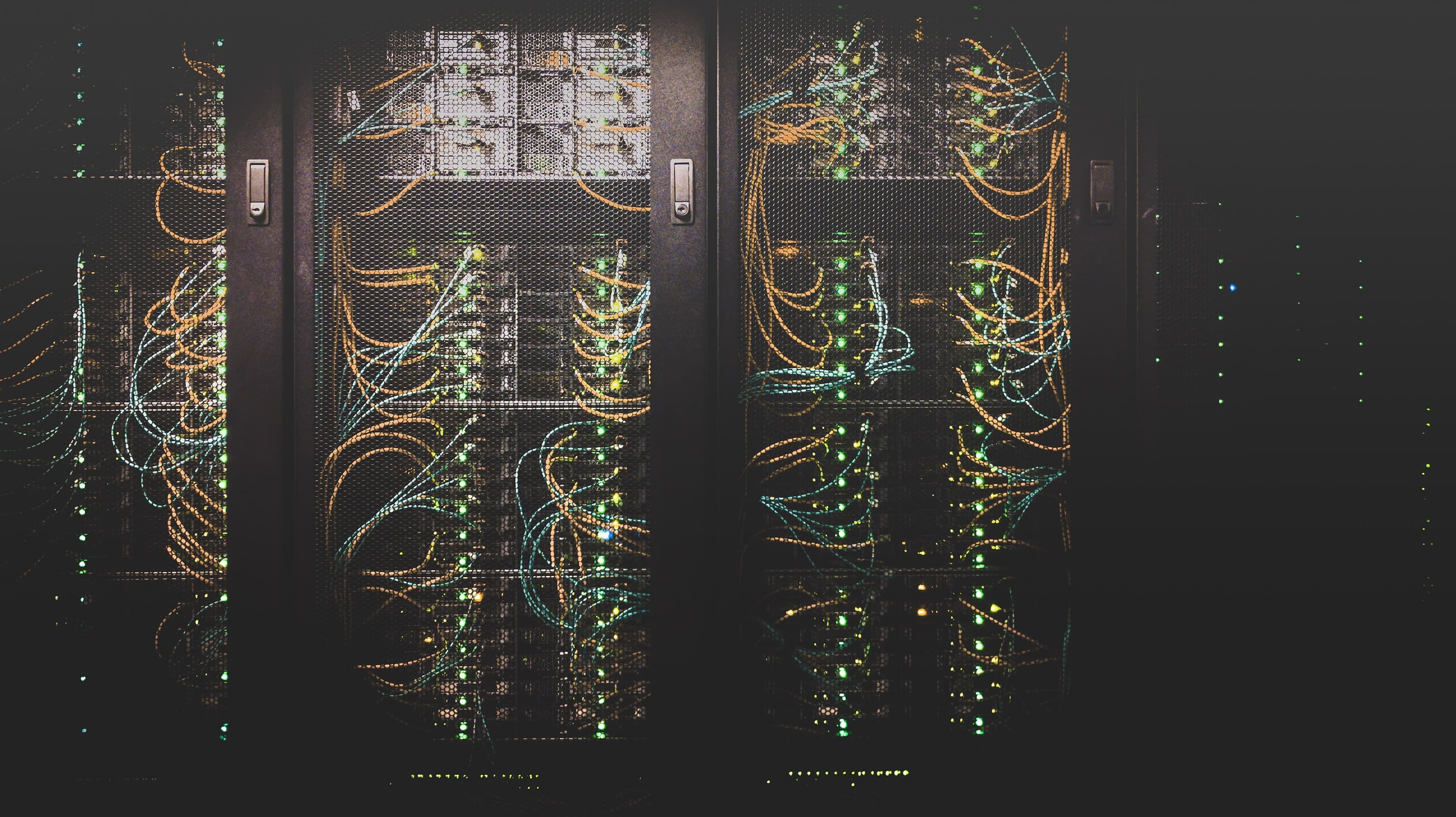 Engineers working inside server room